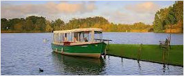 a passenger boat on the broads